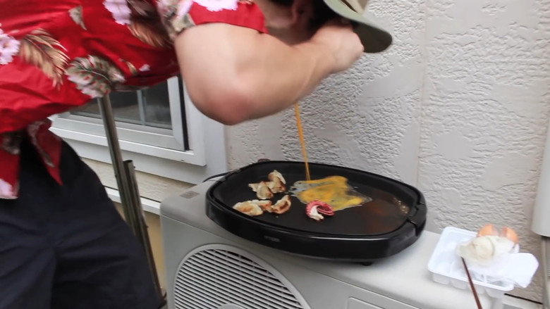 PINK GUY COOKS TAKOYAKI AND RAPS