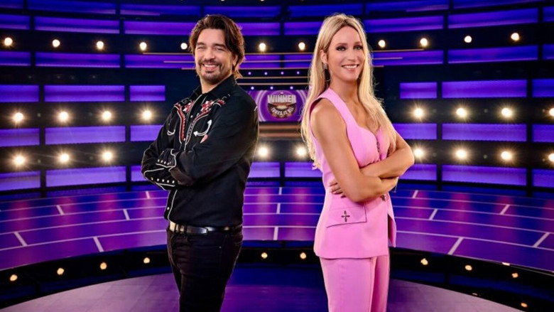 The Winner Takes It All backdrop 2