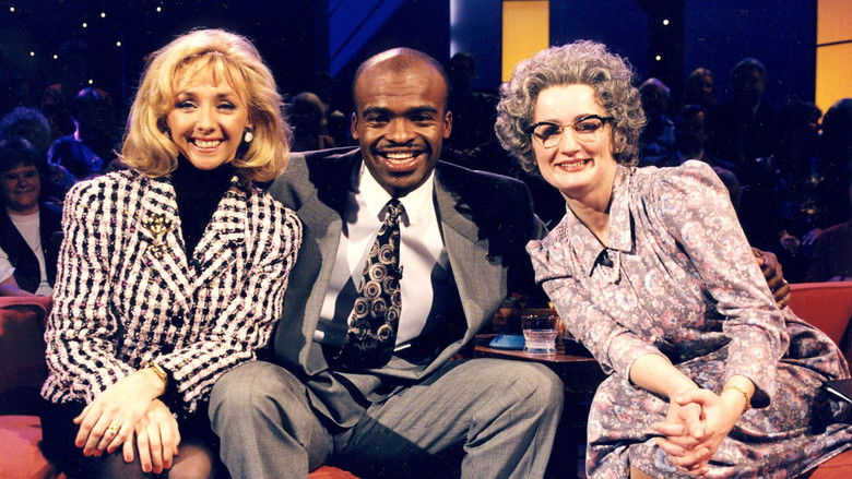 Still image for The Mrs Merton Show season 1 episode 1: Steve Coogan, Debbie McGee, Kriss Akabusi Still image for The Mrs Merton Show season 1 episode 1: Steve Coogan, Debbie McGee, Kriss Akabusi