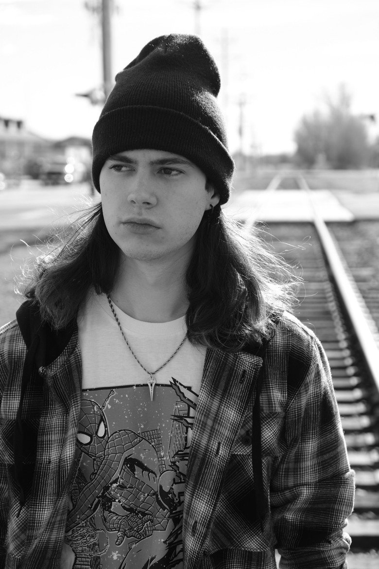 Aidan J Doan