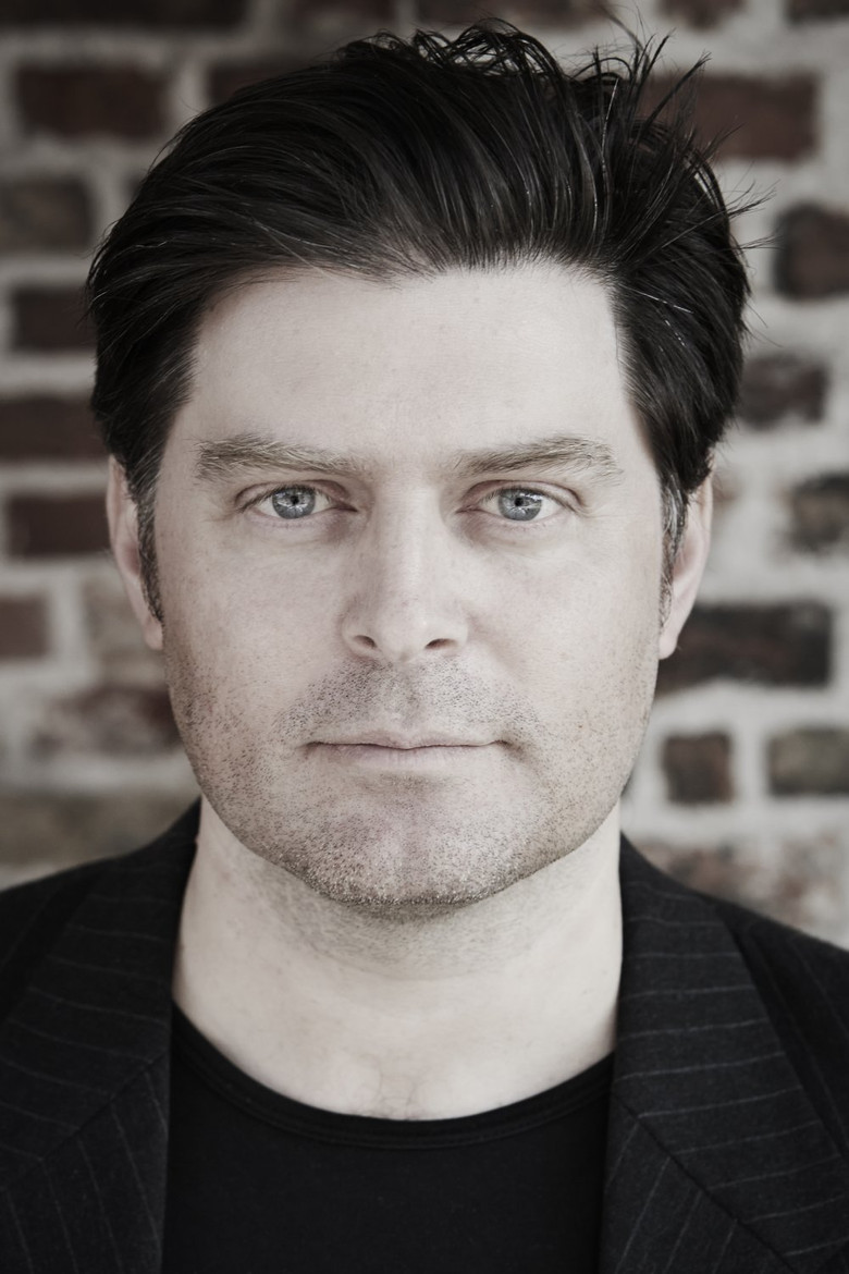 Merlin P. Mann portrait image