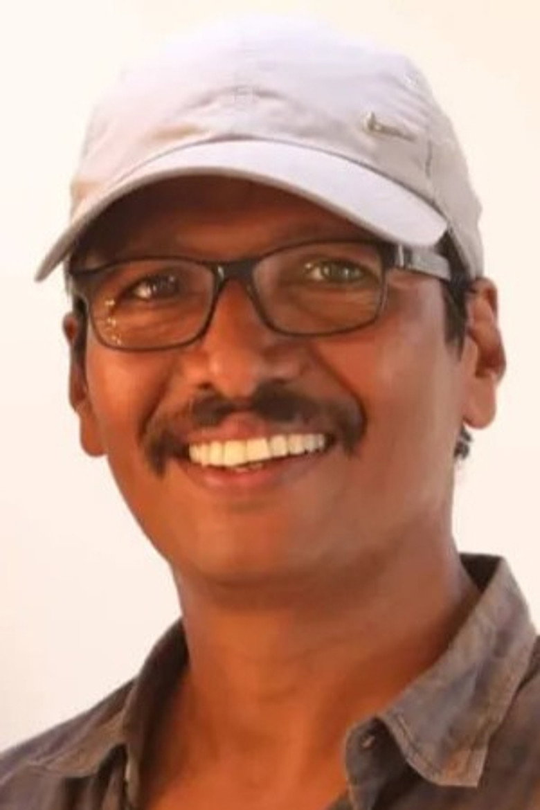 C H Balu portrait