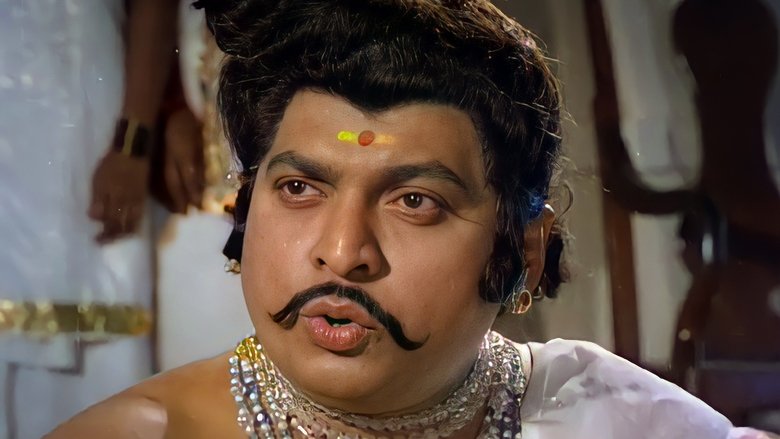 Kadathanaattu Maakkam main backdrop