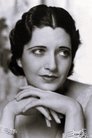 Kay Francis isDr. Carole Nelson