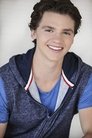 Joel Courtney isPeter Moore