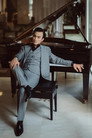 актер Doãn Quốc Đam