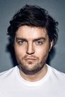 Tom Burke isDennis Rebrov