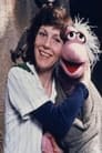 Kathryn Mullen isMokey Fraggle / Cotterpin Dozer / Crosscut Doozer / Merboo Merggle / Rock Hockey Hannah / Wimple Fraggle / The Old Gypsy Lady / Sally Spotless / Tammy Shrub / Baby Doozer / Doozer #2 (voice)