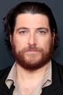 Adam Pally isWade Whipple