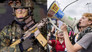 Why is compulsory military service causing controversy?