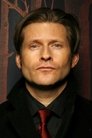 Crispin Glover isHooded Figure