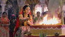 Radha Conducts the Puja