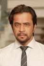 Arjun Sarja isSathyamoothy (White Devil)