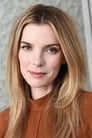 Betty Gilpin isDr. Carrie Roman