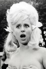 Barbara Windsor isSeaside landlady / Neil's mother
