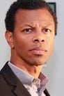 Phil LaMarr isHermes Conrad / Auctioneer / Male party guest (voice)