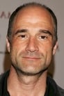 Elias Koteas isThe Policeman