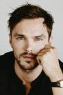 Nicholas Hoult isMike Spritzel