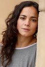 Alice Braga isWoman with dark glasses