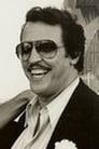 Joe Spinell isGo-Go Club Owner #2