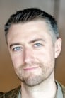 Sean Gunn isDr. Baker