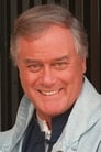 Larry Hagman isJudge Luther Charbonnet