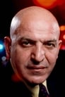 Telly Savalas isPrivate Detective Charles Sievers