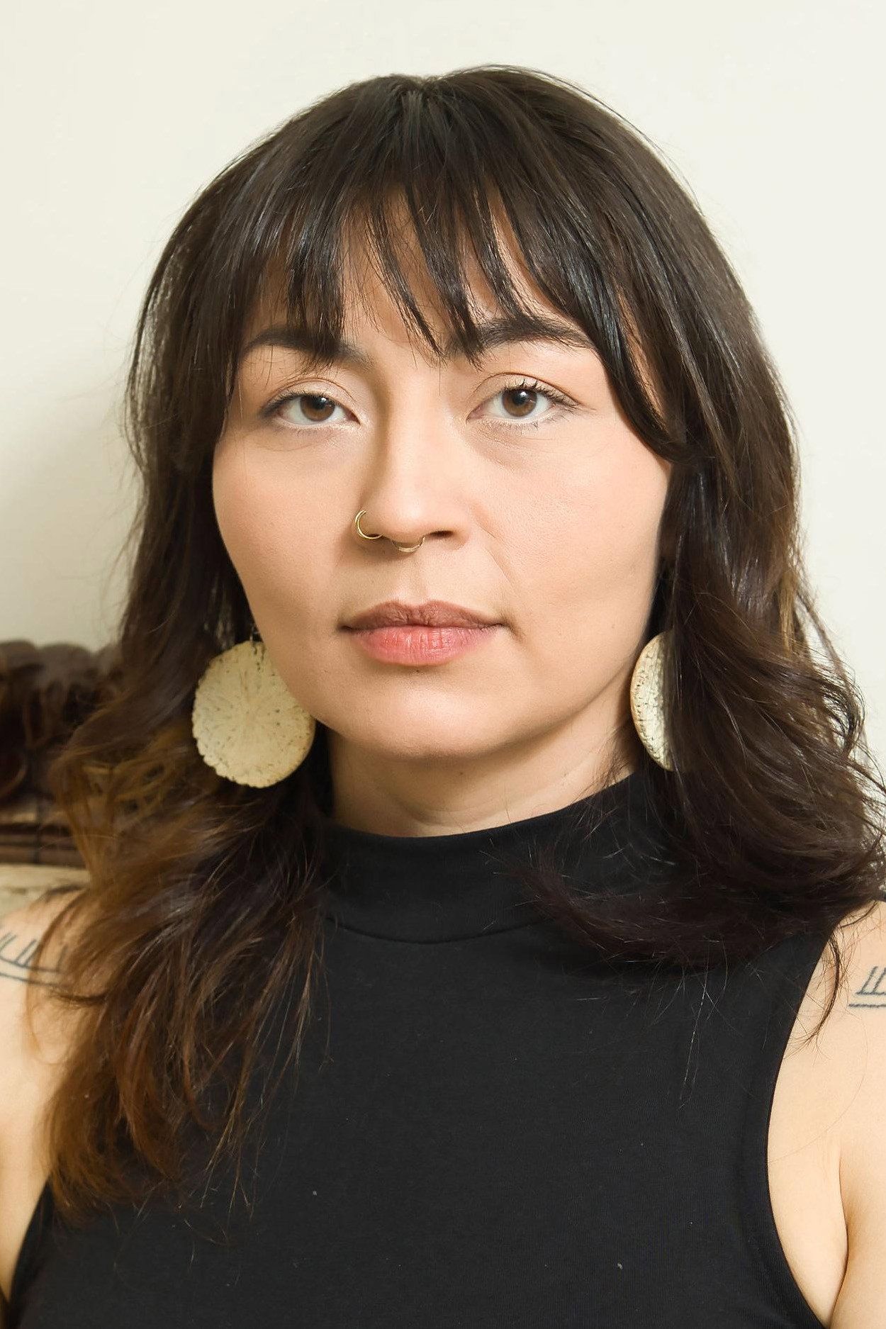 Zorga Qaunaq as Millie in North of North