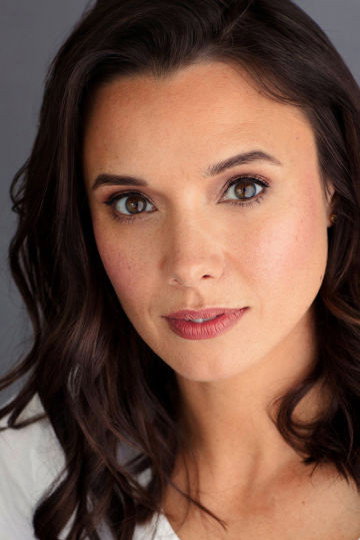 Anna Jullienne as Tania Bishop in Literally Dead