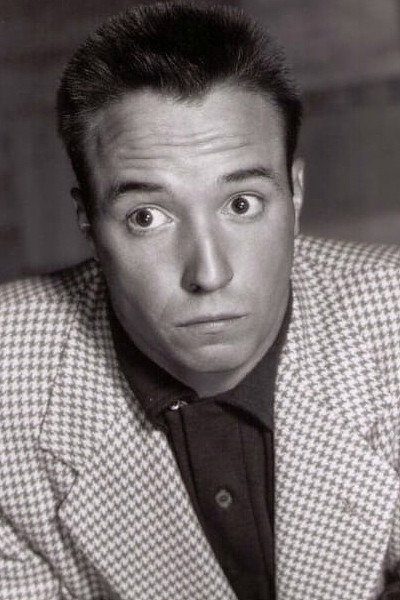 Dick Wesson as Chuck Russell in Paris Follies of 1956
