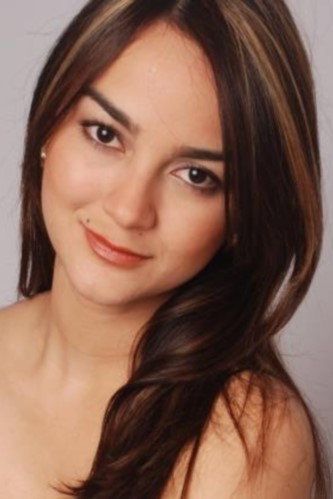 Yiniva Cardenas as Secretaria in EXO Next Door