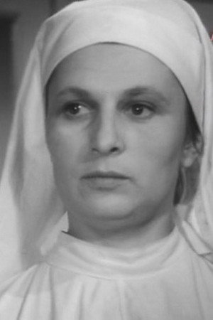 Galina Dunaeva as Алевтина Валерьяновна in The House Opposite