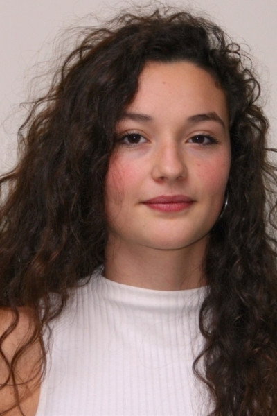 Louvia Bachelier as Zoé in Blame It on Rousseau