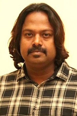 Gokul as Prisoner 1 in Anbirkiniyal