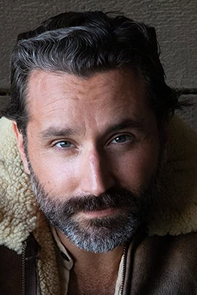 Garrett Marchbank as Frank in Facade