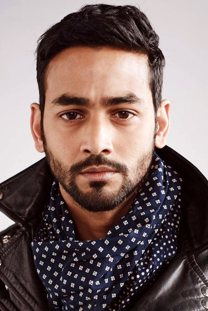 Shayan Munshi as Corporate Man 1 (uncredited) in Home Delivery