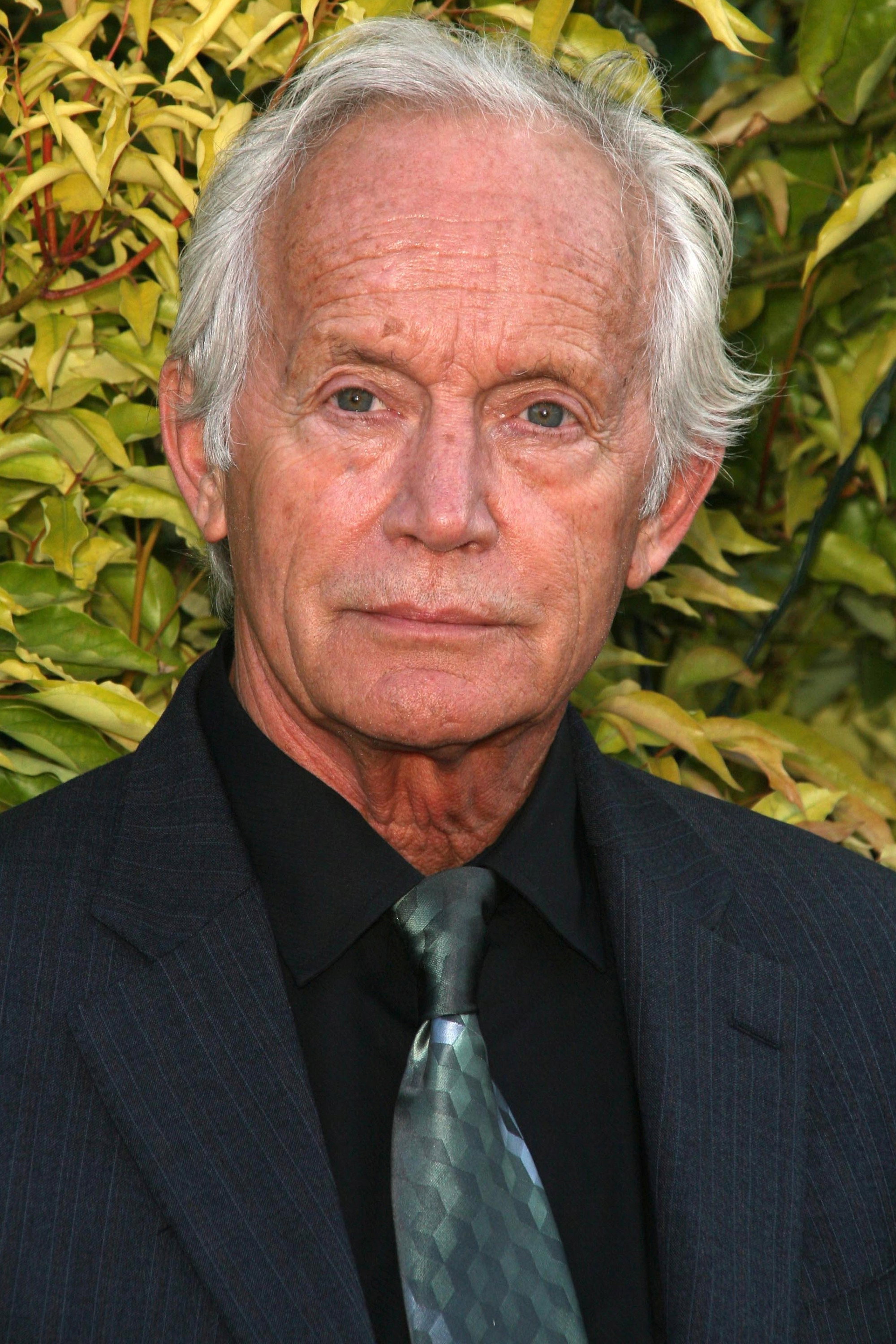 Lance Henriksen as The Host in Hellraiser: Hellworld