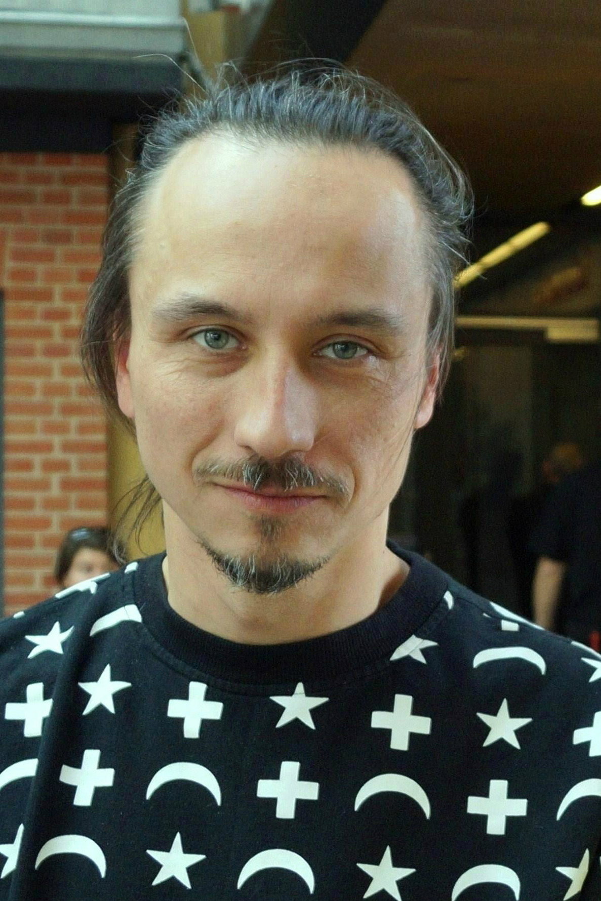 Rafał Maćkowiak as Paweł Kozłowski in The Londoners
