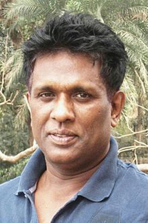 Baharul Islam as Dr. Basudev Natrajan in Pill
