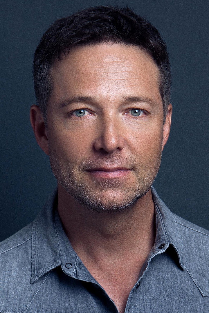 George Newbern as Superman (voice) in Justice League