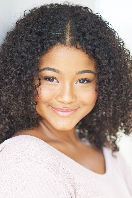 Kayla Hutton as Nikki in One Winter Proposal