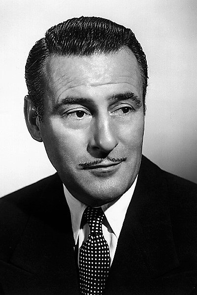 Tom Conway as Dr. Wayne in Operation Murder