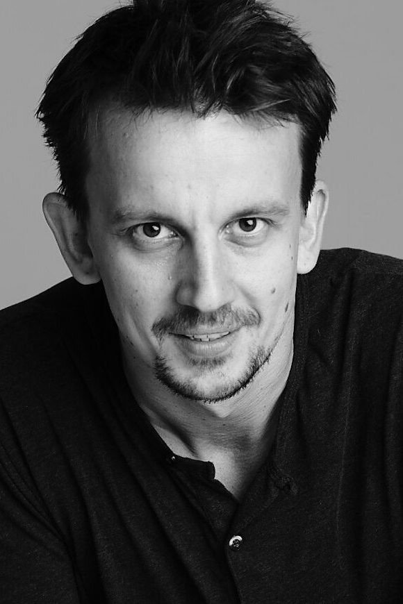 Modest Ruciński as Roman Myszyński in A Grain of Truth