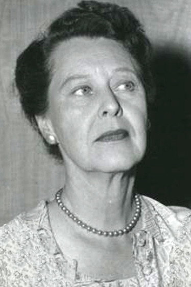 Louise Lorimer as Mrs. Vollard in Mister Cory