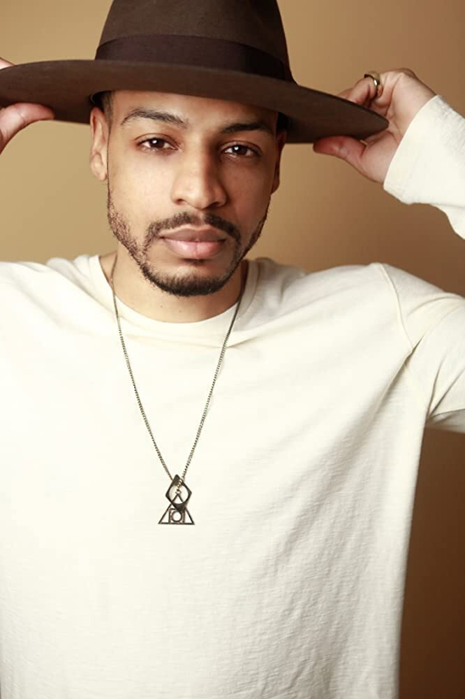 Michael J. Pagan as Quincy Payne in How Stella Got Her Groove Back