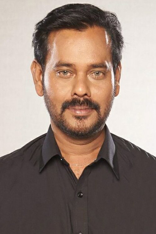 Natarajan Subramaniam as Chief Metropolitan Magistrate M.D. Rajanayagam in Karuppu