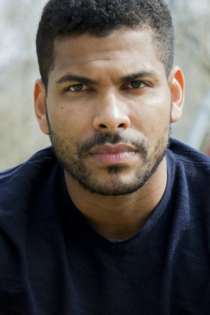Kevin Ezekiel Ogunleye as John in The Third Parent