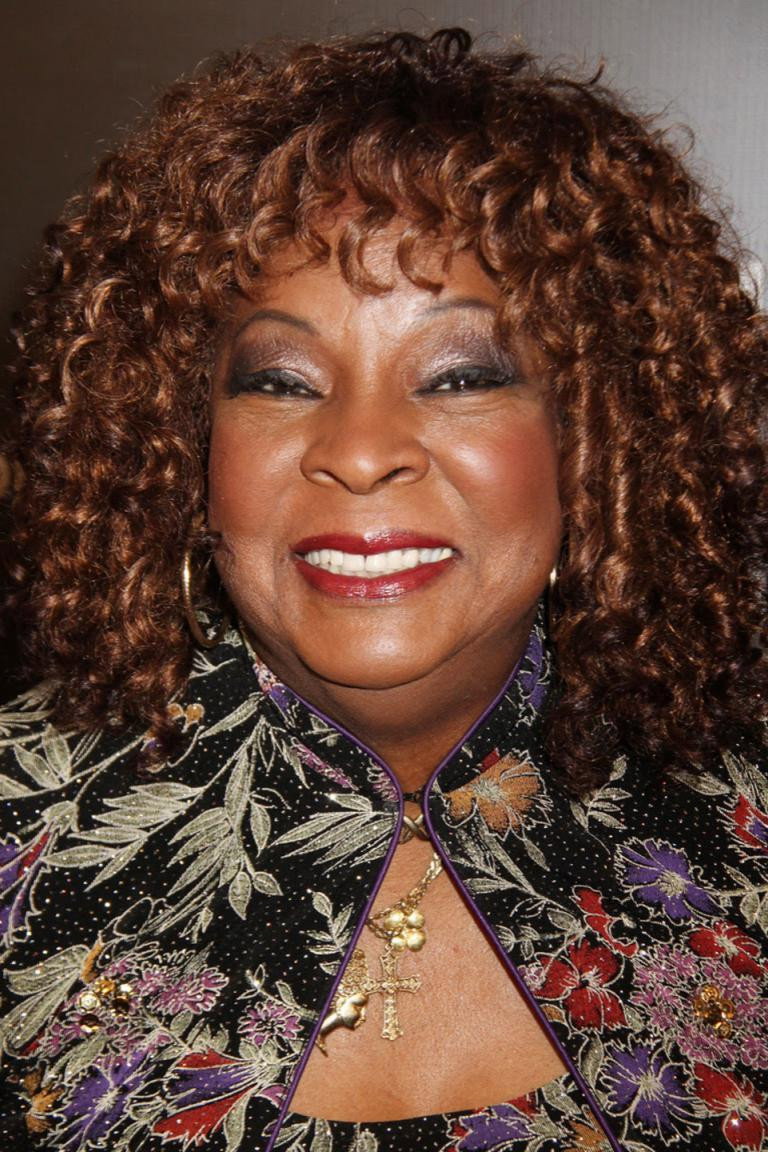 Martha Reeves as Self in By Whatever Means Necessary: The Times of Godfather of Harlem