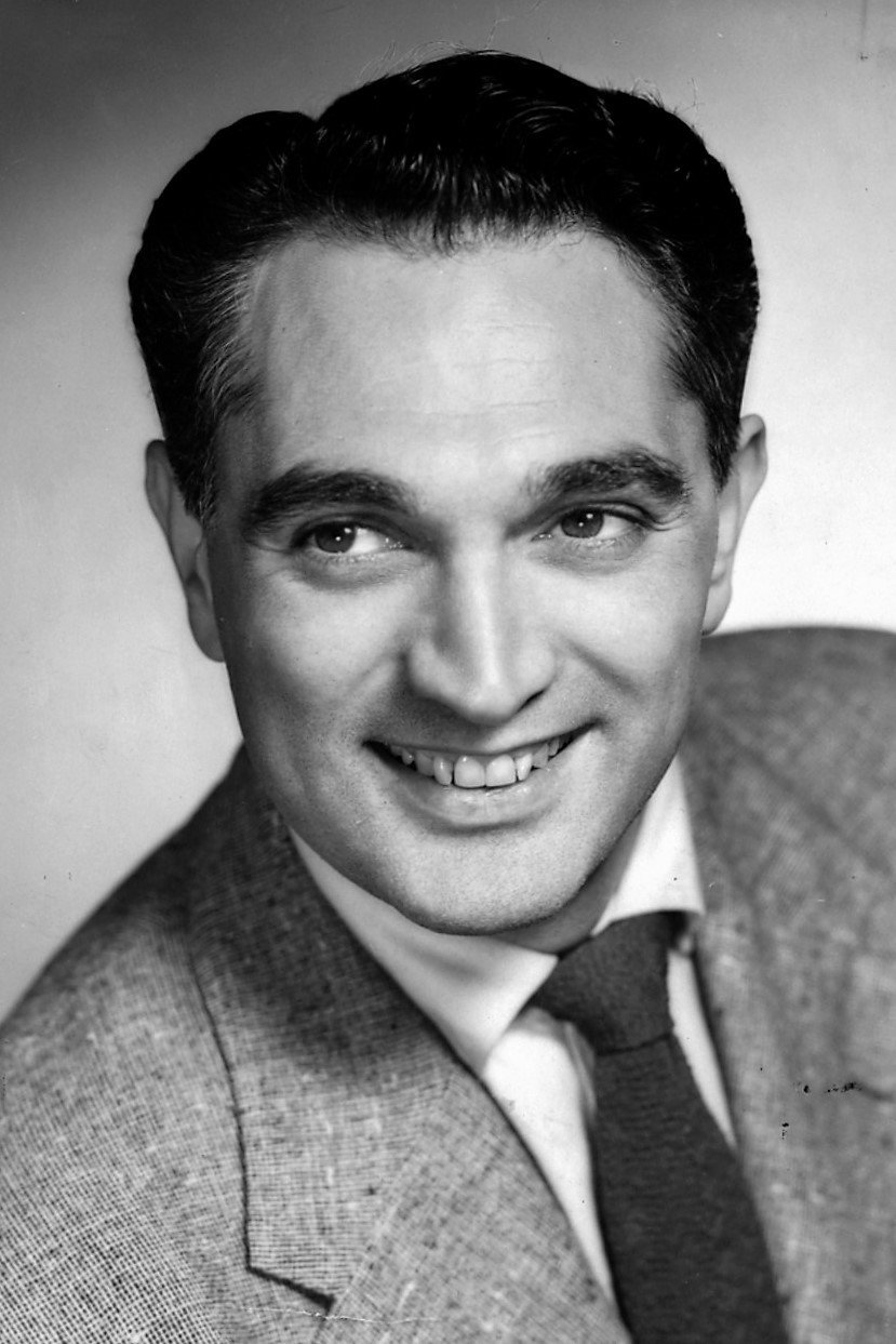 Robert Alda as Maj. William Morgan in Secret File, U.S.A