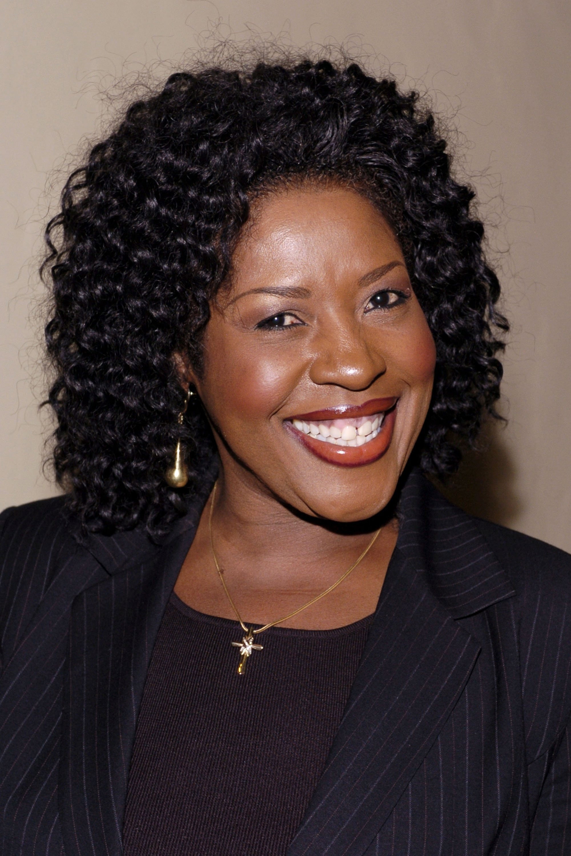 Jo Marie Payton as Suga Mama Proud (voice) in The Proud Family